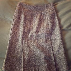Tweed pencil skirt with pleats and velvet accent